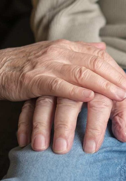 holding-hands-elderly-couple